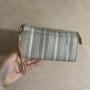 12. Coach wristlet